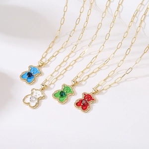 Golden bear pendant necklaces with colorful heart-shaped stones in blue white green and red