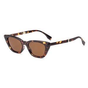 Stylish tortoiseshell cat-eye sunglasses with brown lenses and golden metal hinges