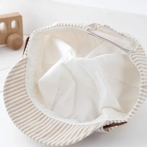 Striped baby baker boy hat with PU leather strap and cotton lining in beige color