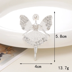 Detail view of silver ballerina brooch with dimensions 5.8cm by 4cm and 13.7g weight