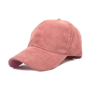 Minimalist corduroy baseball cap for men and women in rose pink with a textured finish