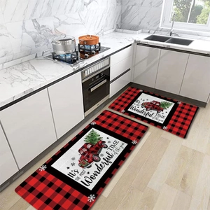 Set of two buffalo plaid Christmas kitchen mats featuring a red truck and tree
