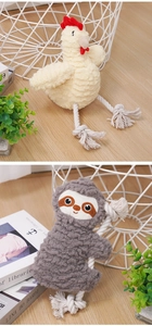 Close-up of textured lamb velvet dog toys with durable cotton rope legs and embroidery