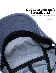 Detail view of denim newsboy cap featuring a soft cotton sweatband and premium stitching