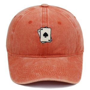 Detail view of playing cards embroidery on washed cotton vintage baseball cap