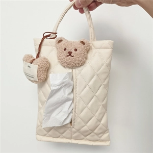 Quilted beige leather car tissue box cover with plush bear decor and hanging strap