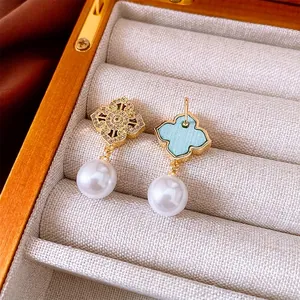 Vintage gold earrings with hollow flower, micro-inlaid zircon and pearl drops