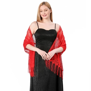 Close-up of elegant red lace shawl with intricate floral patterns and long fringe trim