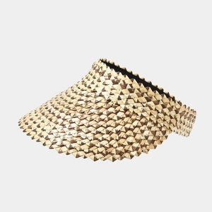 Macro shot of geometric textured straw sun visor with unique serrated edge detail
