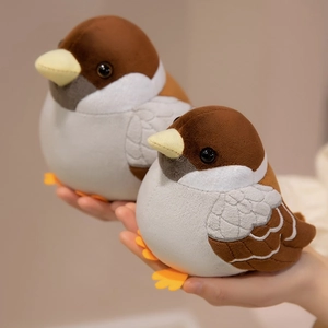 Soft sparrow plush bird toys in two sizes held in hand with warm indoor background