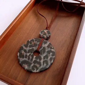 Minimalist double circle leopard print acrylic pendant necklace with brown cord
