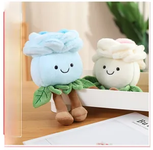 Detailed plush rose flower dolls in blue and cream with cute embroidered smiling faces
