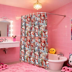 Detail of Christmas shower curtain featuring festive snowman patterns in a pink bathroom