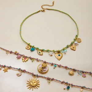 Three bohemian 18K gold stainless steel necklaces with colorful beads and sun heart charms