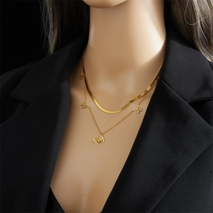 Double layer gold butterfly necklace with flat snake chain and delicate link chain
