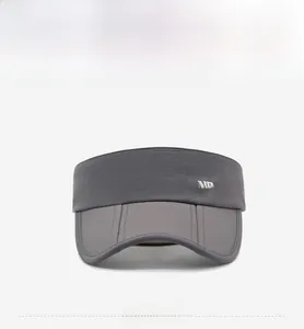 Close-up of dark grey sun visor hat with white NY&JA logo and wide brim for sun protection