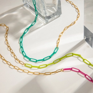 Three 18k gold plated stainless steel paperclip chain necklaces in gold, green, and pink
