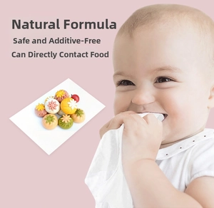 Detail of portable baby wipes with natural formula shown alongside an infant