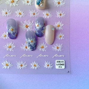 White floral nail art stickers with delicate flower designs for elegant manicures