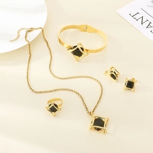Luxurious geometric gold stainless steel jewelry set with black stones and square motifs