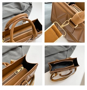 Close-up of brown quilted handbag featuring gold zippers and textured wide strap detail