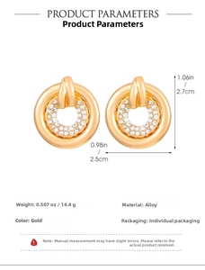 Macro detail of gold double hoop earrings with cubic zirconia inlay and product dimensions