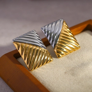 Minimalist square earrings with two-tone gold and silver finish and striped texture