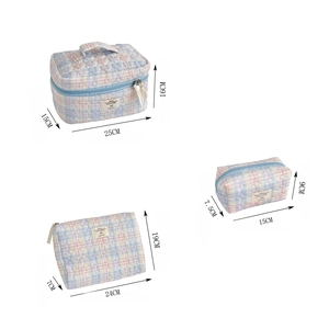 Three colorful checkered quilted cotton makeup bags in different shapes and sizes