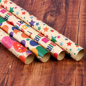 Four rolls of Happy Birthday kraft wrapping paper with star and balloon patterns