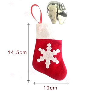 Red Christmas stocking felt cutlery holder with silver utensils and size measurement