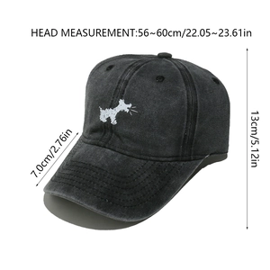 Close-up of small white dog embroidery on washed cotton vintage black baseball cap