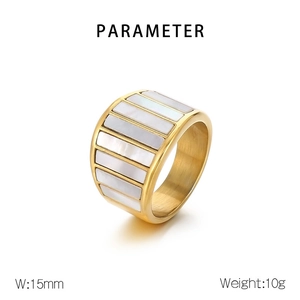 Detail showing 15mm width of gold-plated stainless steel ring with white shell inlays