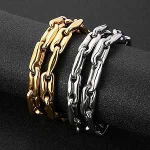 Hip hop coffee bean link chains in gold and silver finish shown on cylindrical props