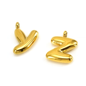 Polished gold 3D puffy letters Y and Z stainless steel pendants on white background