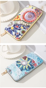 Detail of artistic mosaic print PU leather long wallets with durable gold zippers
