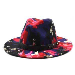 Detail of wool fedora hat with graffiti print and studded black leather band