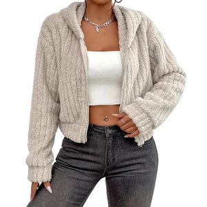 Detail of light grey teddy fleece hoodie featuring textured vertical stripes and zip closure