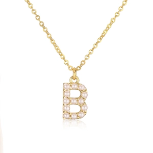 Elegant gold letter B pendant necklace with micro-set pearls on a minimalist O-chain