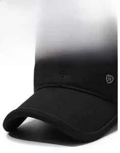 Detail of winter baseball cap with ear protection and silver metallic shield R logo