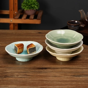 Traditional ceramic fruit tray with ice-crack glaze and high foot base for tea snacks