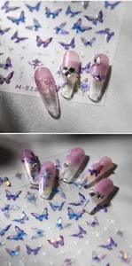 Detailed view of M-518 purple butterfly nail stickers on gradient pink fake nails
