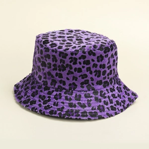 Detail of soft purple leopard print faux fur material on a vintage flat top bucket hat
