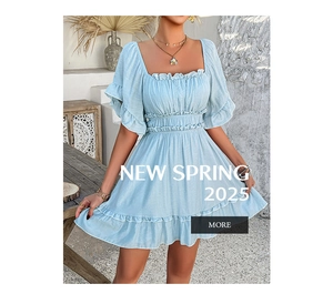 Detail of light blue mini dress featuring ruffled sleeves and layered hemline design