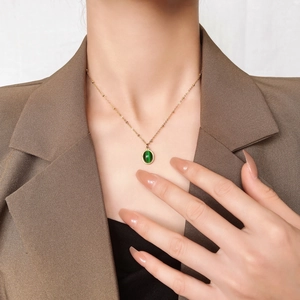 Elegant 18k gold plated stainless steel necklace with oval green cat-eye stone pendant