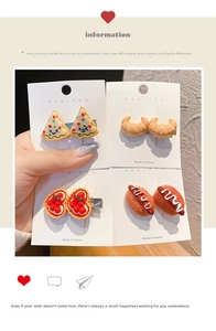 Detail of 4-piece funny food hair clips showing pizza, croissant and hot dog designs