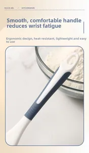 Ergonomic silicone spatula handle detail with blue accents and a convenient hanging hole