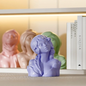 Detailed close-up of elegant female goddess bust silicone mold in soft purple and pink tones