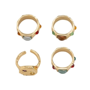 Gold plated ring set with irregular hammered texture and colorful gemstones in 4-grid view