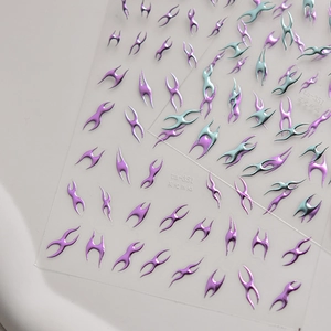 Metallic flame nail art stickers in purple and cyan chrome finish with tribal star patterns