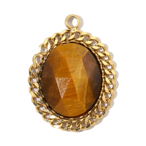 Detail of oval gemstone pendant featuring a polished tiger eye stone and gold-tone frame